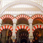 red & white double arches - La Mezquita - Great Mosque of Cordoba - Cordoba - Spain