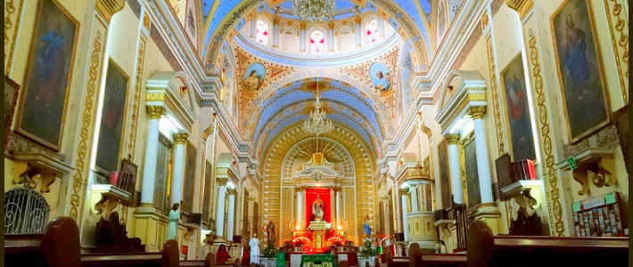 elaborate interior of a Baroque church in Puebla - Mexico